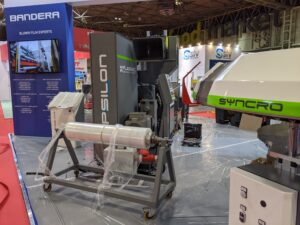 Image of the Plasmac Epsilon post-industrial waste recycling machine on the UK Extrusion stand at Interplas UK 2021